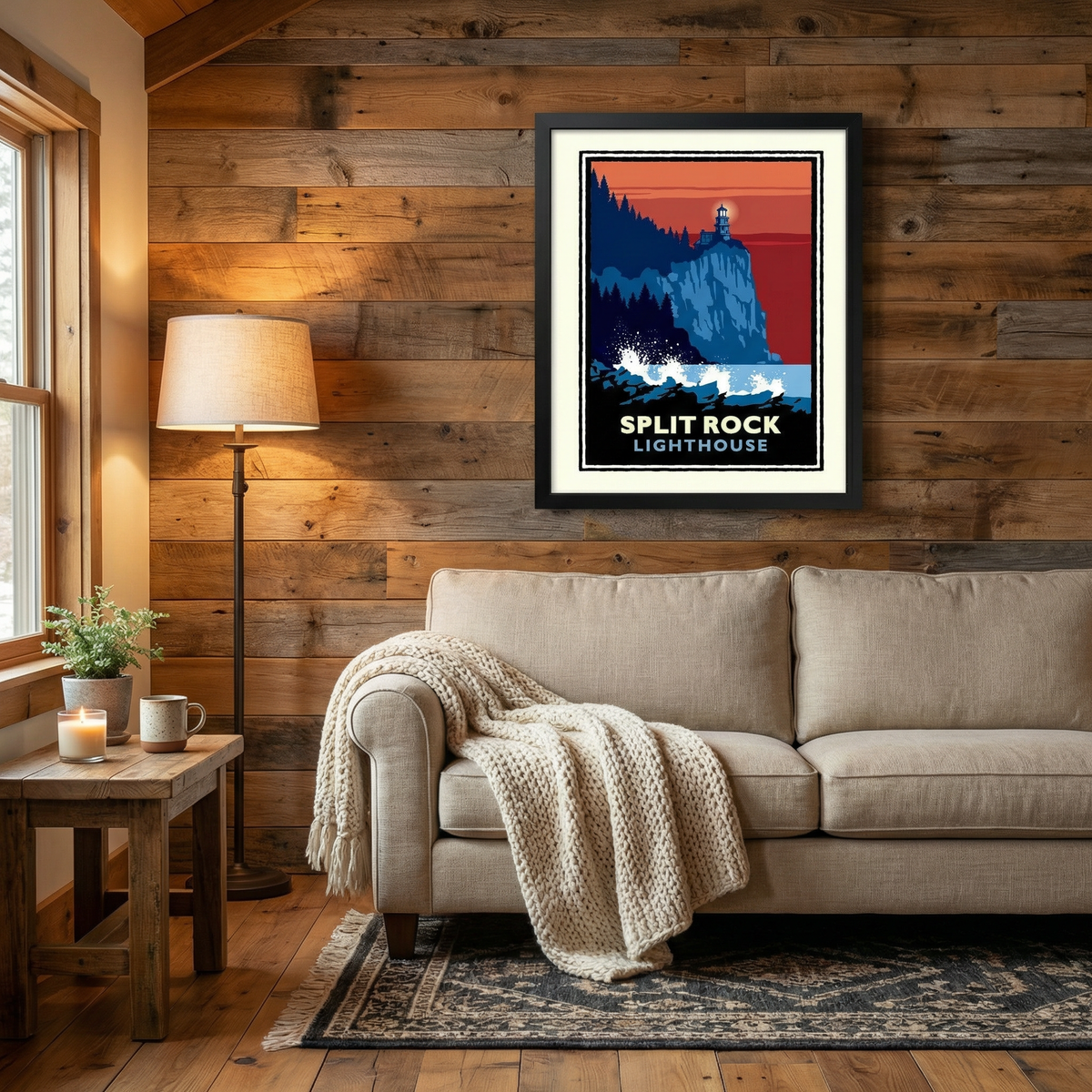 a cozy living room with a beige sofa, a wooden side table, and a framed poster of the Split Rock Lighthouse hanging on the wall.