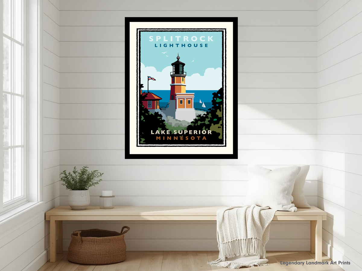 a framed poster of the Splitrock Lighthouse in Minnesota, hanging on a white wall above a wooden bench.