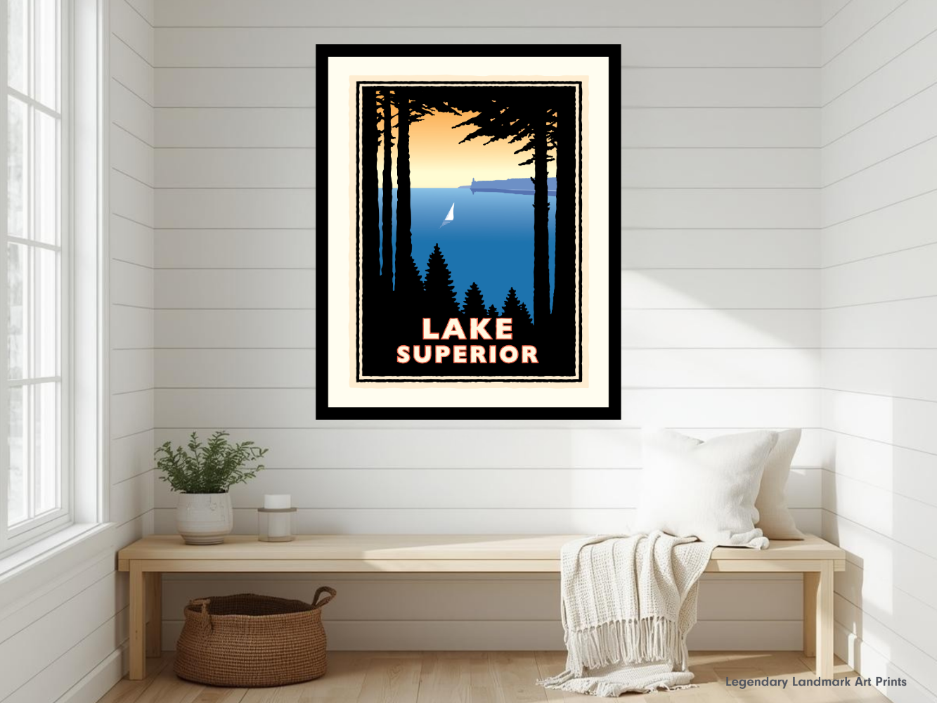 Framed artwork of Lake Superior with a bench and decor in the foreground